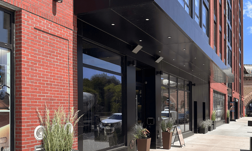 Black ALPOLIC MCM cladding envelope of Queens residential building