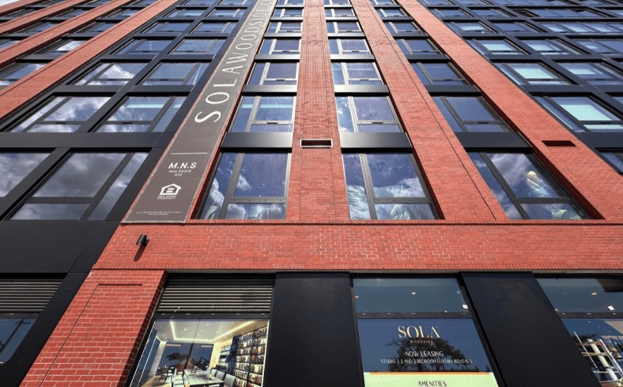 Black ALPOLIC MCM cladding Queens residential building