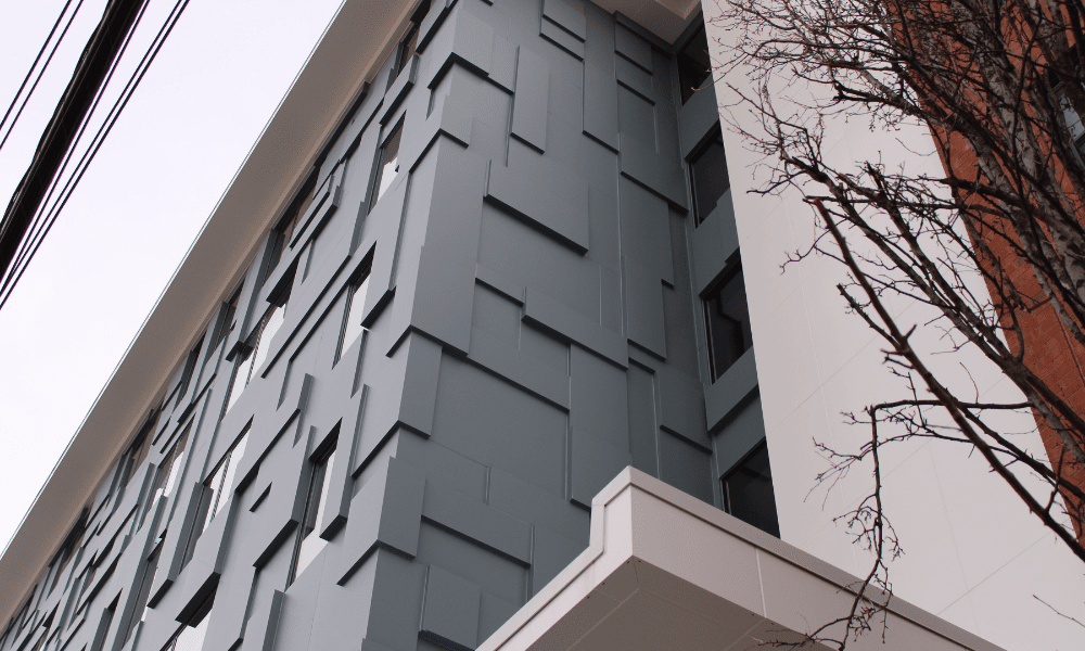 ALPOLIC Matte Blue MCM clads Hoboken residential building - close up