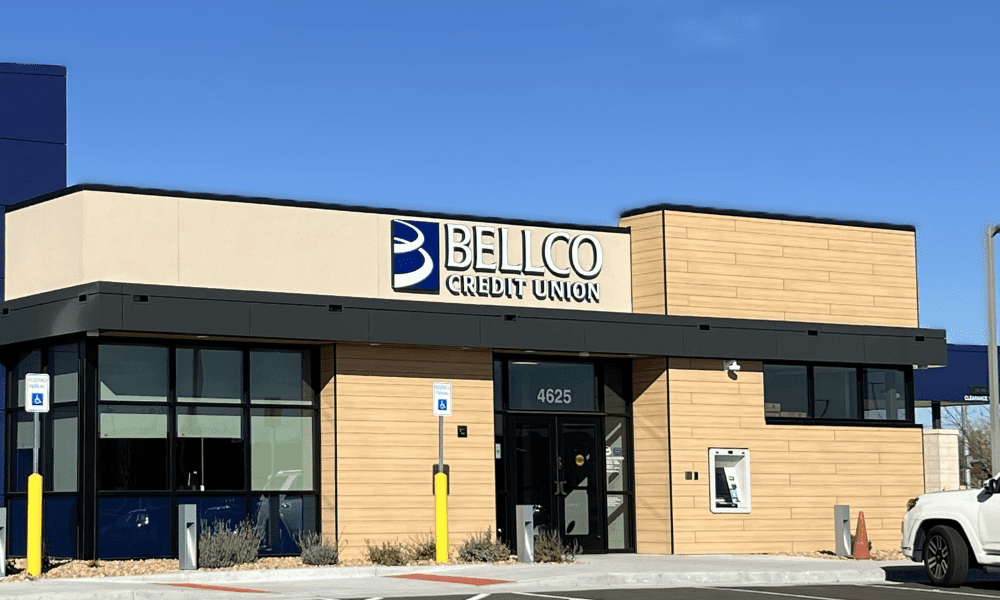 Front fascia of bank building clad with ALPOLIC Charcoal MCM