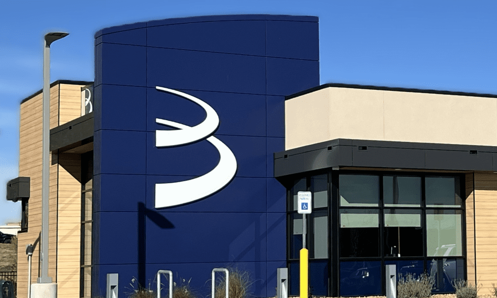 Closeup of signage on credit union clad with ALPOLIC MCM